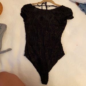 Black lace body suit